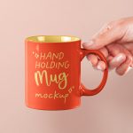 001-hand-holding-mug-cup-drink-coffee-tea-brand-graphic-design-free-psd-mockup-pixeden