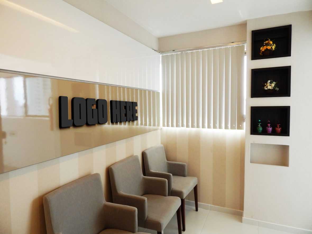 Black Logo Mockup on Office Waiting Room Wall