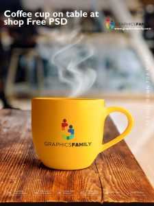 Coffee cup on table at shop Free PSD