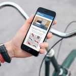 Cyclist with iPhone 6 Freee Mockup