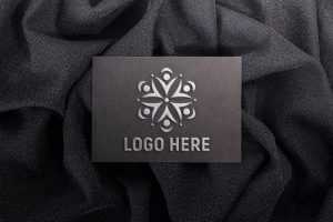Embossed logo mockup on black paper