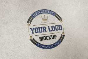 Engraved logo mockup on gray cement wall