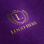 Gold Logo Mockup on Purple Fabric Texture