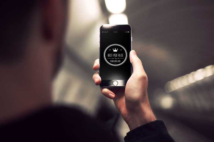 iPhone 6 in Hand PSD Mockup