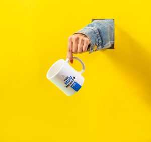 Mug in Hand Mockup