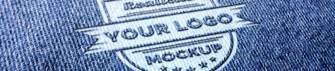Realistic logo mockup on blue jeans or blue fabric