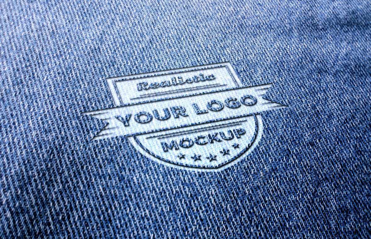 Realistic logo mockup on blue jeans or blue fabric