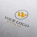 Stamped logo mockup on white paper - Download Grátis Stamped logo mockup on white paper