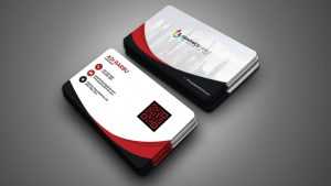 White business card with red and black details