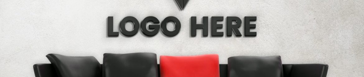 White Wall Logo Mockup with Black Sofa