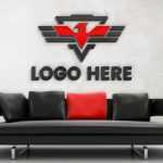 White Wall Logo Mockup with Black Sofa - Download Grátis White Wall Logo Mockup with Black Sofa