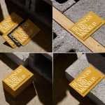 4 Free Business Card Mockups Placed on Concrete Brick