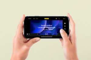 A Hand-Holding Landscape Smartphone Screen Mockup PSD