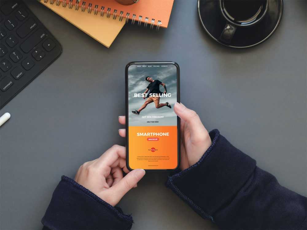 A Person Holding an iPhone Free Mockup PSD