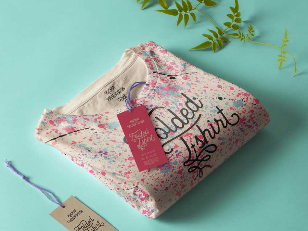 Folded T-Shirt with Labels Mockup