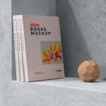 Free 3 Books Mockups on Concert Wall Shelf Scene - Free PSD Download Free 3 Books Mockups on Concert Wall Shelf Scene