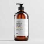 Free Amber Cosmetic Bottle Mockup in Studio Light