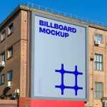 Free Billboard on Brick Building Mockup
