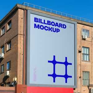 Free Billboard on Brick Building Mockup