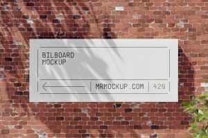 Free Billboard on Brick Wall Mockup