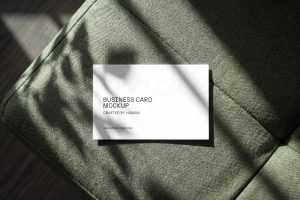 Free Business Card Mockup On Sofa From Top