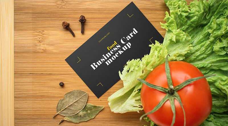 Free Business Card Mockup on Wooden Table with Vegetable Surroundings