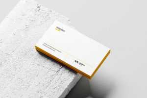Free Business Card Mockup Stacked On Concrete
