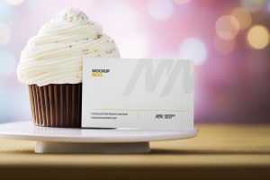 Free Business Card Mockup With Cup Cake Bokeh Background