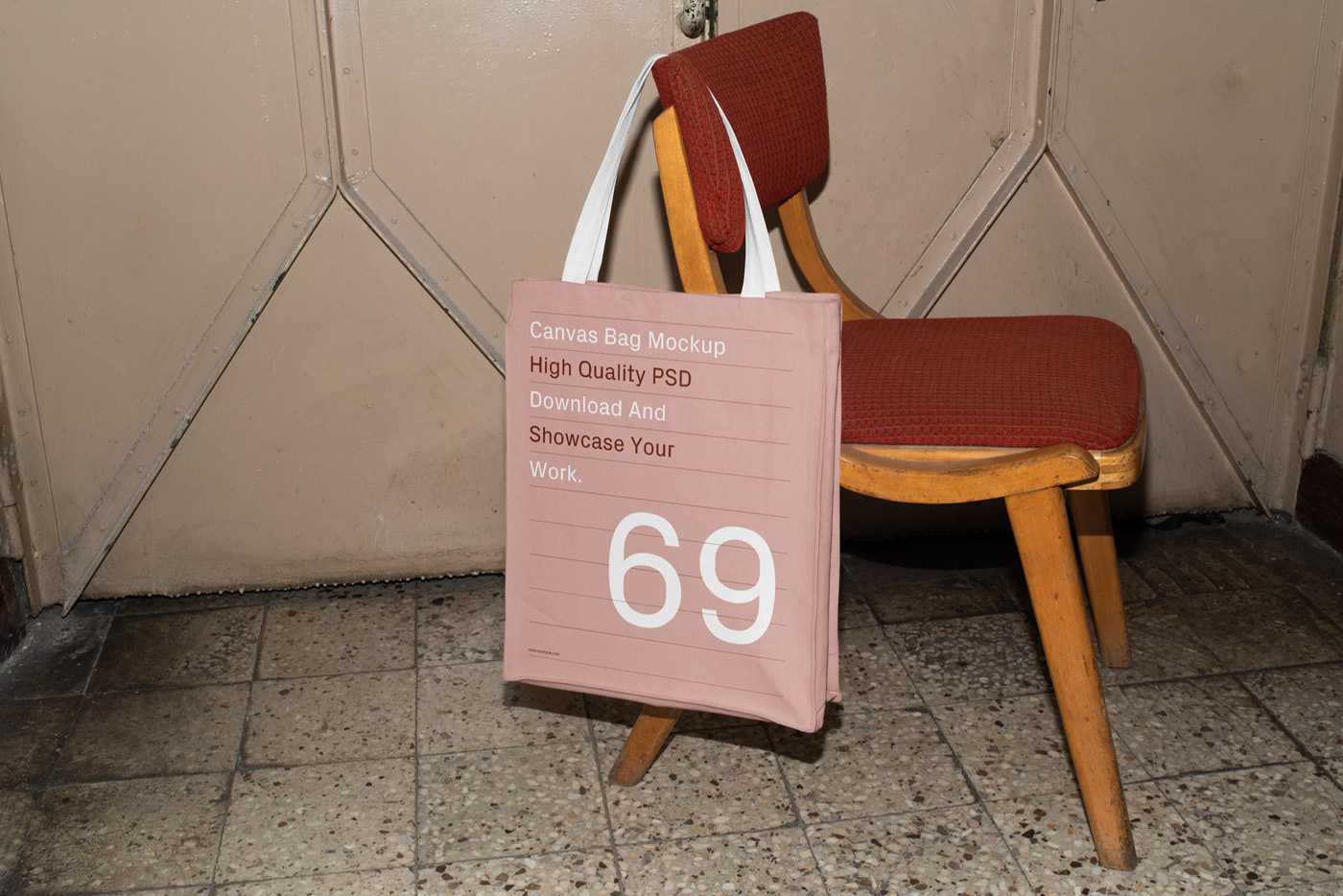 Free Canvas Bag Hanging on Chair Mockup