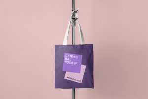 Free Canvas Bag Hanging on Tripod PSD Mockup