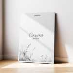 Free Canvas Mockup Leaning Against Wall with Soft Sunlight