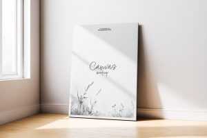 Free Canvas Mockup Leaning Against Wall with Soft Sunlight