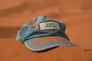 Free Cap Logo Mockup on Desert Sand