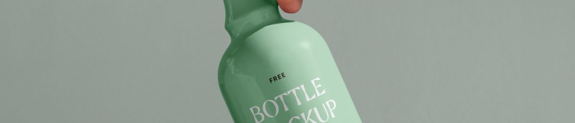 Free Ceramic Bottle in Hand Mockup