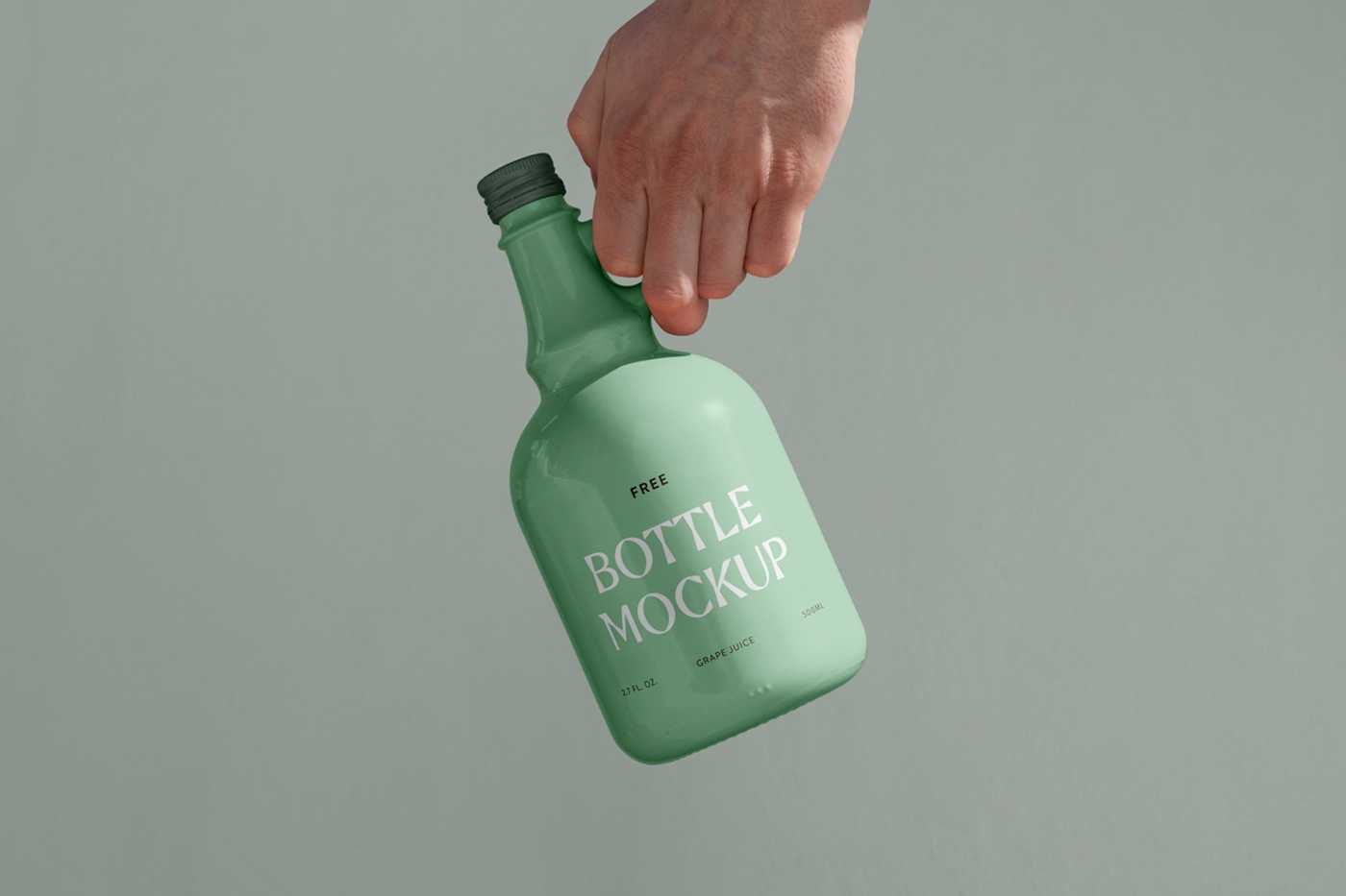 Free Ceramic Bottle in Hand Mockup