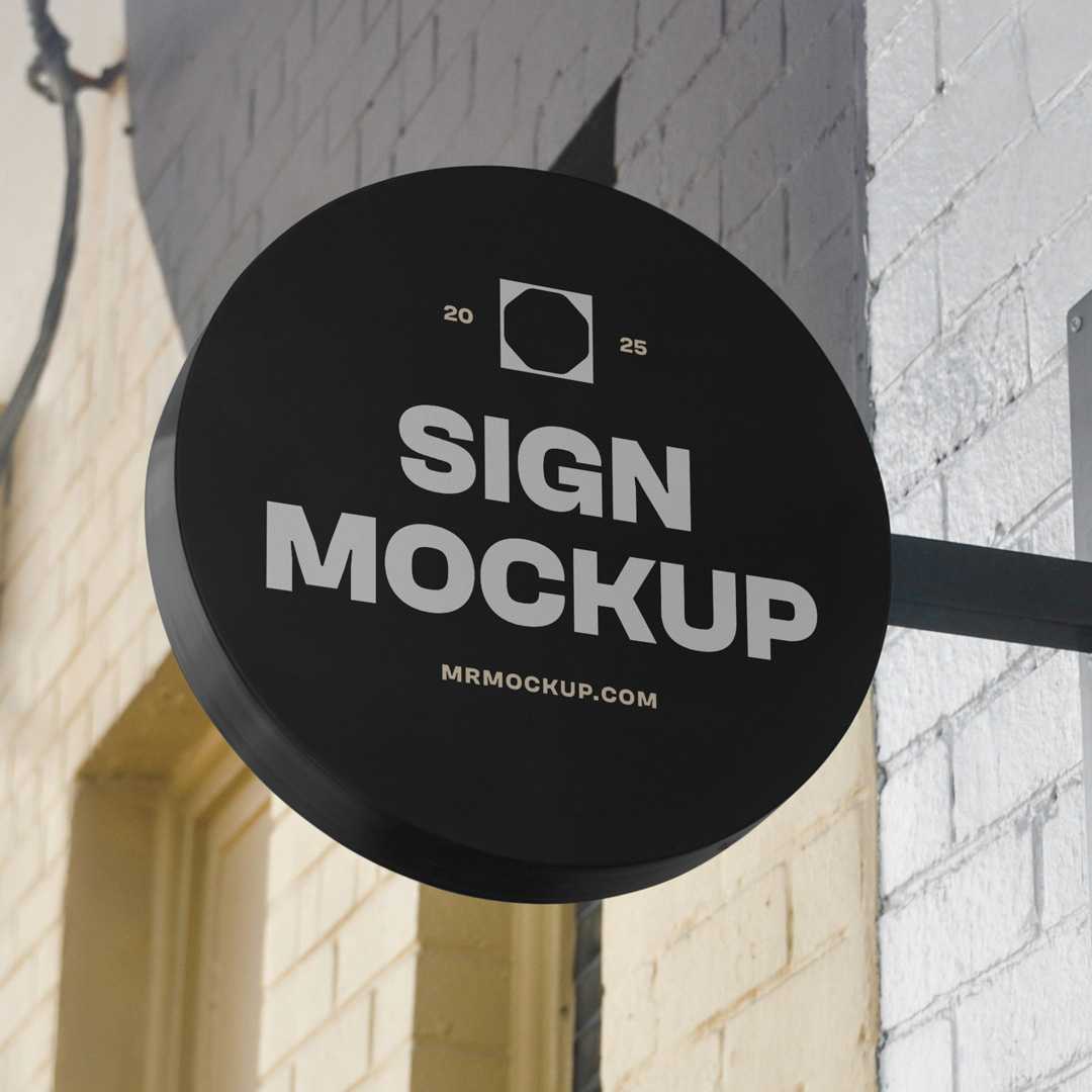 Free Circle Signage Attached to Wall Mockup
