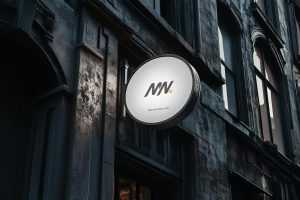 Free Circle Signboard Mockup On Building Wall