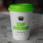 Free Coffee Cup on a Countertop Mockup