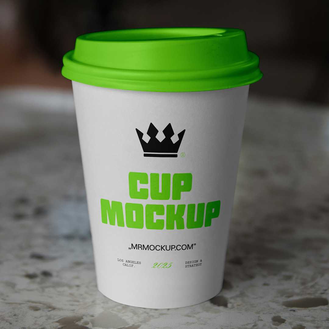 Free Coffee Cup on a Countertop Mockup