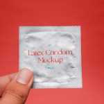 Free Condom in Hand Mockup