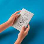 Free Cotton Hand Holding Notebook Mockup - Free PSD MOCKUPS | PsFiles