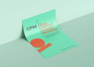 Free Curved Paper Poster Mockup Laying on Wall