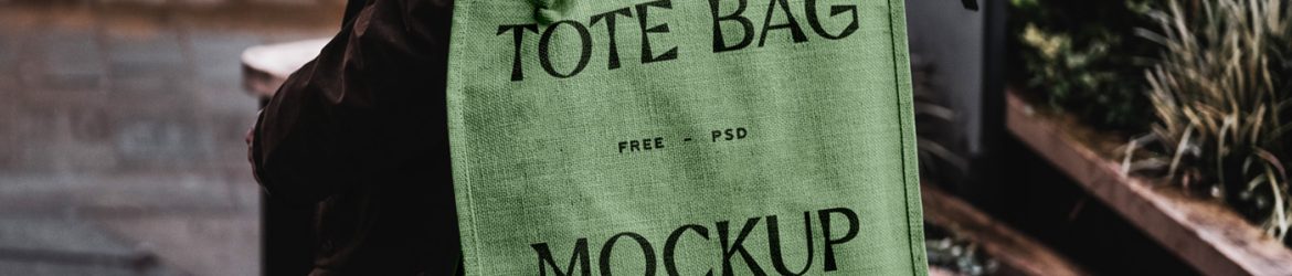 Free Eco Bag Carrying by Man Mockup