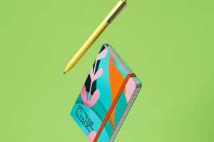 Free Falling Pocket Notebook Mockup PSD