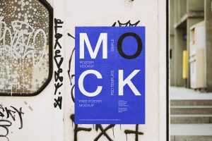 Free Graffiti wall Glued Poster Mockup PSD