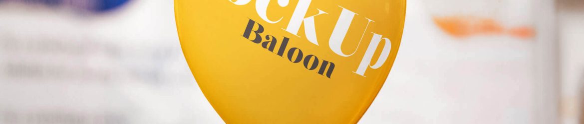Free Hand Holding Balloon Mockup with Blurry Background