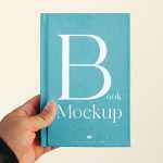 Free Hand Holding Book Cover Mockup PSD - Free PSD Download Free Hand Holding Book Cover Mockup PSD