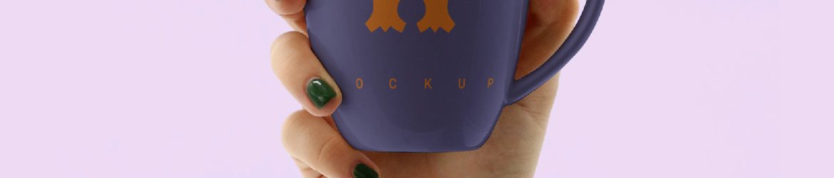 Free Hand Holding Mug Mockup PSD