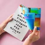 Free Hand Holding Ring Binding Notebook Mockup PSD