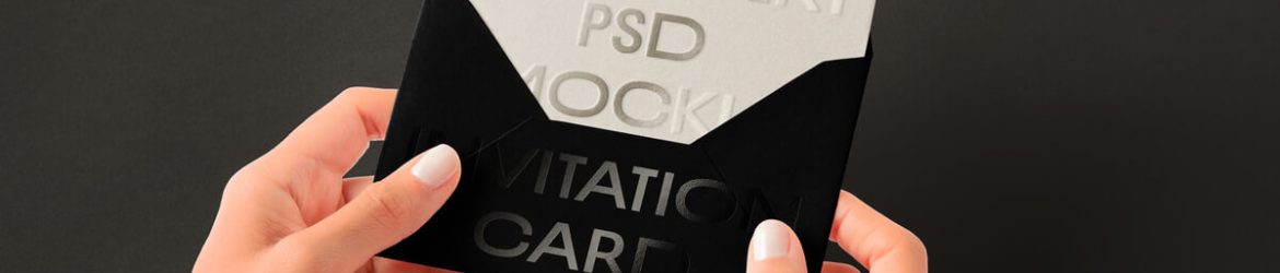Free Hand Holding Wedding Invitation Card Mockup PSD